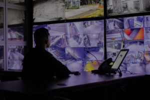 Dispatcher in OnView's Live Surveillance Monitoring Center