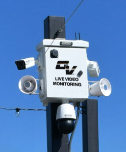 OnView Active Deterrent Unit with surveillance cameras and audio speakers mounted on a pole.